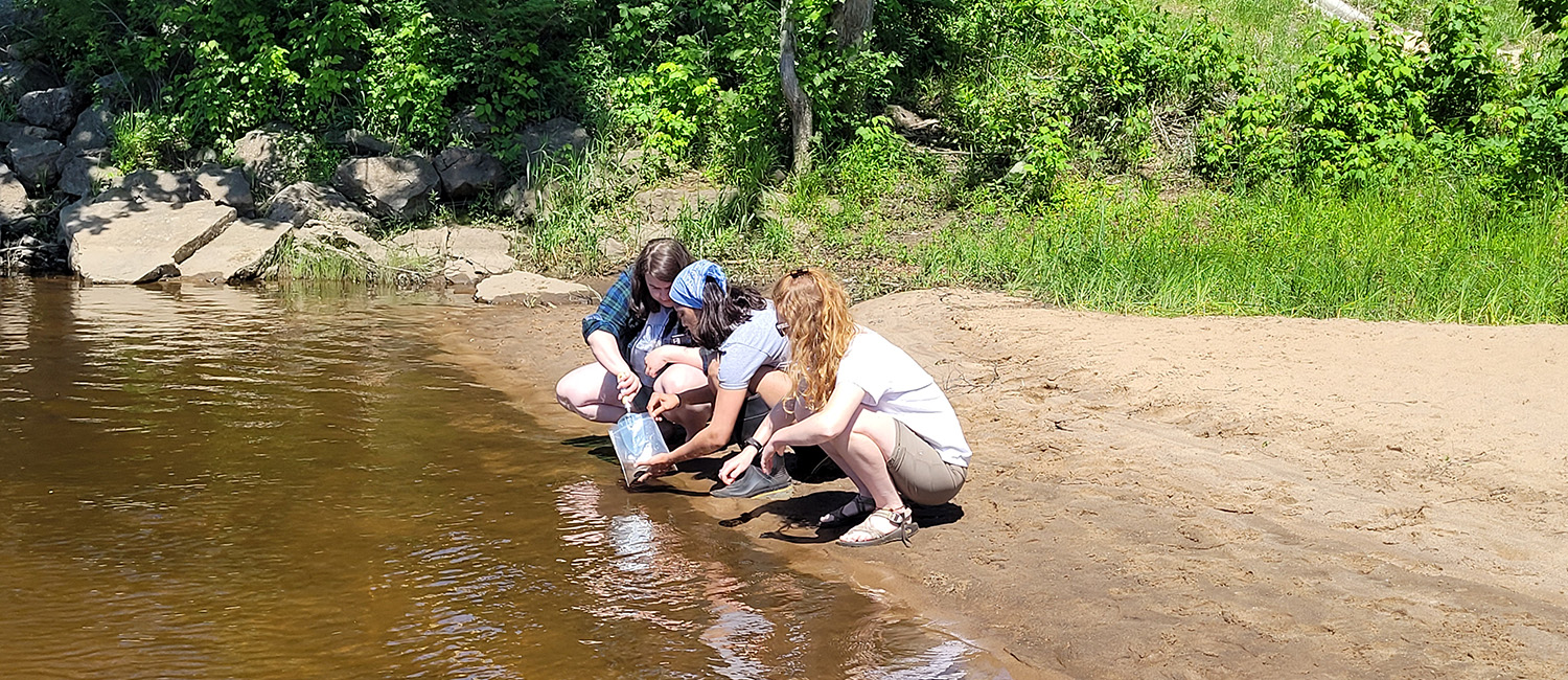 students collecting water samples